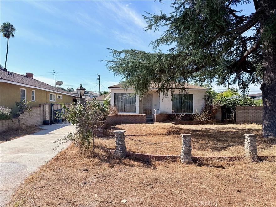 Welcome to this sweet single-family home situated on an expansive, flat lot with endless possibilities. This inviting residence features 3 comfortable bedrooms and 1 bathroom, highlighted by a spacious, light-filled living room and generously sized bedrooms that provide both comfort and functionality.

A detached 2-car garage includes an additional office space at the rear, perfect for working from home or creative use. The property also offers a guest house complete with its own kitchen and bathroom, ideal for extended family and visitors. The expansive backyard presents an excellent opportunity for future development, including the potential to build an ADU (Accessory Dwelling Unit), while still maintaining ample outdoor space for entertaining, gardening, or relaxation. Conveniently located near shops, markets, schools, and transportation, this property is the perfect starter home with incredible upside potential.