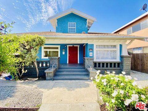 Photo of 1474 W Vernon Avenue, Los Angeles, CA 90062 (MLS # 26638505)