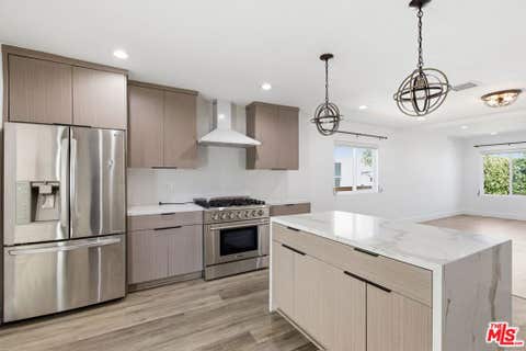 Photo of 6415 Madden Avenue, Los Angeles, CA 90043 (MLS # 26807039)