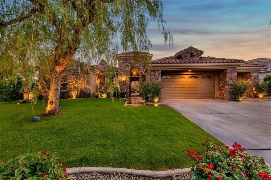 **Stunning Santa Rosa floor plan on the 11th fairway of the Gary Player Course in guard-gated Mira Vista.** 
This 3BR/3.5BA, 3,763 sq. ft. lakefront home offers unobstructed lake and mountain views. a private courtyard with fireplace, and an open layout with a separate wet bar and a temperature controlled wine closet.
The gourmet kitchen features granite countertops, beautifully painted cabinetry, a built-in refrigerator, double ovens, stainless steel appliances, walk-in pantry, a a large center island with it's own cooktop, and a custom built breakfast nook.
The primary suite has a private fireplace, perfect for those cold winter nights, This room offers private access to the beautiful backyard and a large walk-in closet. The primary suite's spa-like bath showcases dual vanities, a dedicated makeup area, a jetted soaking tub, and an independent glass-enclosed shower.
Enjoy a resort-style backyard with pool/spa, fire pit, retractable awning, and panoramic lake and mountain views. Additional features include tile flooring, beautifully carpeted bedrooms, a dedicated office including built-in cabinetry, a separate great/tv room and surround system throughout.
Here is a rare opportunity for you to own this premier property on one of Mira Vista's sought out locations.