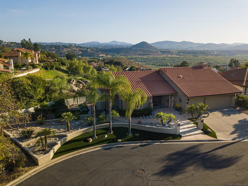 Largest home in all of Sonata 3650 sq ft! One of a kind, there is none like it! Very private and quiet with only one neighbor, sits at the end of the cul-de-sac. Lots of large windows with spectacular views. Very light and bright home. Large custom designed home office. Large elevator, no need to use stairs. Two large primary bedrooms each with adjoining baths and walk in closets, plus two more bedrooms for a total of four. Three full baths. Extra-large family and living rooms, each with lots of windows, you will be amazed at the views. Separate spa room with spa tub and with built in refrigerator, built in freezer, built in dish washer and plumbed for stack washer and dryer. Could be used with adjoining bedroom as an ADU. Home is in outstanding condition! Most of the kitchen appliances were replaced less than a year ago. The tile floor in kitchen and family room is less than a year old. Roof was completely done about 10 years ago and with new tile. The exterior was completely painted about 6 years ago. Irrigation is automatic drip system on timer. Very low maintenance, low water yard. Two a/c’s and two furnaces. Full house alarm. Built in vacuum. Full house intercom. Epoxy floors in garage. Garage has lots of cabinets for storage. Two navel orange trees and one tangerine tree that produce a large crop each year. Sonata has four pickleball courts and two tennis courts for exclusive use of home owners. Two small parks with grass. Super close to the freeway and the carpool lane entrance. Three gas stations close by and very near a major shopping center (Macys, Pennys, etc.). You have to see this home to appreciate it and all that it has to offer. Shows pride of ownership everywhere! Call for your private viewing.