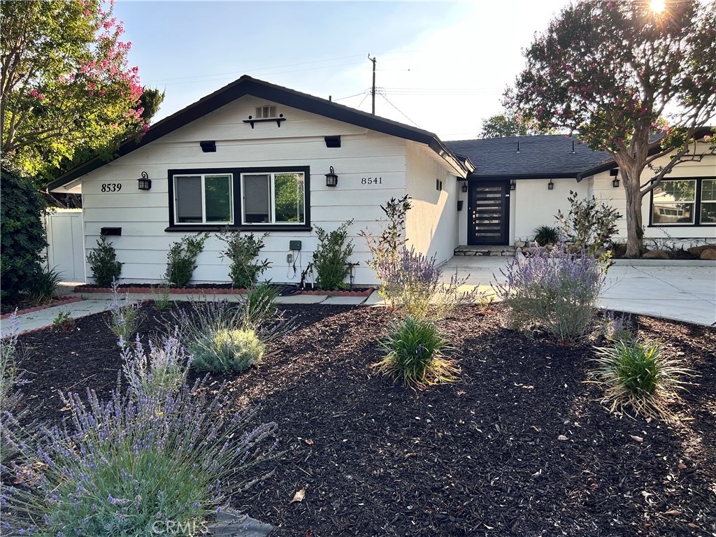 Welcome to this FRESHLY PAINTED beautiful estate located in the heart of Northridge. Located on a quiet tree-lined street and beautifully maintained, this house will finally give you the sense of peace and quiet you have been looking for! A large driveway sits in the front of the property providing ample parking space, in addition to newer drought-tolerant landscaping. Inside the gorgeous front door, you are greeted with a combination of rustic and luxury finishes throughout. Espresso-colored wooden floors create the foundation for the entire house, in addition to charming high-ceilings and wooden beams sitting above the living area. The stunning kitchen features quartz countertops, brand new stainless steel appliances, a pantry, and glamorous pendant lights hanging over a large island. Take one step down from the living area into your mini bar, perfect for entertaining, and a closet space dedicated to a washer and dryer unit. To the right of the home entrance, embarks a hallway which leads to the 3 bedrooms. The two spacious guest bedrooms are located to the left of the hallway, both featuring plenty of natural light and ample closet space. An elegant guest bathroom sits on the right of the hallway with a luxurious black quartz vanity and marble tiling encompassing the shower. The roomy master bedroom sits facing the two guest bedrooms with a large closet and private full bathroom, consisting of a newly done vanity and shower. This property sits on a decent size lot which it shares with an ADU, but has private access to the sizable backyard with NEW turf, NEW concrete sitting area, and lush citrus trees. Also, the heater/ac and kitchen appliances are all NEWER. In addition to close access to the 101 and 118 freeways, this property is also just minutes from Costco, CSUN, Porto’s, and Northridge Shopping Center. Don’t miss out this on this great opportunity! PROPERTY WILL BE AVAILABLE FOR SHOWING THIS UPCOMING WEDNESDAY AND PHOTS UPLOADED. Link to apply: https://apply.link/nuuFre0