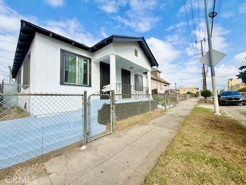 Photo of 2411 Griffith Avenue, Los Angeles, CA 90011 (MLS # MB26008636)