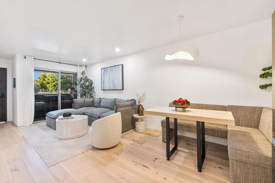 PRICE IMPROVEMENT -- Now $239,000 Fully FurnishedModern Palm Springs Designer Condo | Incredible Value | Custom Furnishings IncludedDiscover one of the best finds in Palm Springs--a fully remodeled, fully furnished condo reimagined with meticulous detail and Japanese-inspired Wabi-Sabi design. Redesigned by a local designer, this home feels warm, refined, and truly one of a kind.Natural light fills the open-concept space, leading to a private patio with 180-degree mountain views and a peaceful overlook of the resort-style pool and spa just steps away. Inside, the living area features a custom fireplace wall with a built-in smart TV, paired with designer-crafted furniture created to match the natural wood floors for a seamless, organic aesthetic. These custom pieces are included, giving the home a move-in-ready, magazine-worthy feel.The modern kitchen showcases sleek cabinetry, under-cabinet lighting, and the rare convenience of an all-in-one washer/dryer thoughtfully integrated into the kitchen--a highly sought-after feature that adds everyday ease without sacrificing style. The spa-inspired bathroom adds a boutique hotel touch with a smart toilet, premium fixtures, and calming contemporary design.Set within a very well-kept community with park-like grounds and plenty of extra parking, residents enjoy 5 sparkling pools, multiple spas, 4 tennis courts, beautifully maintained landscaping, and included water & trash. And because this home sits on fee land, you own the land--an invaluable advantage in Palm Springs.Just minutes from Downtown Palm Springs, golf, hiking trails, and the Aerial Tramway, this fully furnished condo is ideal as a full-time residence, weekend escape, or a thoughtfully curated second home. At this new price point, it's an exceptional opportunity to own a piece of Palm Springs paradise at outstanding value.Welcome to 2857 N Los Felices #203--your modern, move-in-ready Palm Springs retreat.