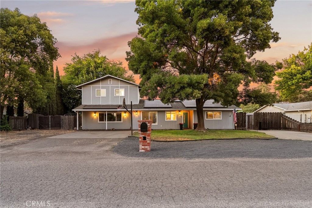 In one of Chico’s most desirable north-side locations, situated on over a half-acre, lies a property that feels like a year-round retreat. Welcome to 4298 Keith Ln, a home designed for entertaining, relaxing, and living life to the fullest. The heart of this home is the beautifully updated kitchen, featuring bar stool seating, top-quality appliances, and sleek modern countertops, perfect for casual mornings or hosting friends. Two living spaces offer room to gather, with one featuring a cozy wood stove that makes winter nights a dream. Downstairs, you’ll find two comfortable guest bedrooms and a full bathroom, perfect for family, visitors, or creating a home office or flex space. Upstairs, the primary suite is a true sanctuary, offering total privacy and a private balcony overlooking the sparkling pool, a perfect spot for morning coffee or evening sunsets. The completely reimagined ensuite bathroom is stunning, with oversized tile floors, dual sinks, a designer soaking tub, and a massive walk-in shower featuring two rainfall showerheads and multiple handheld wands. A large walk-in closet provides plenty of space to stay organized. Step outside, and you’ll find a backyard designed to impress. The recently rebuilt and resurfaced pool sparkles with new electrical, plumbing, decking, filters, and pumps. Two jump rocks and deck jets add to the fun, while color-changing pool lights create a stunning nighttime ambiance. Raised deck seating areas, a glass firepit, poolside cabana space, and an outdoor lounge make this the ultimate spot for summer gatherings. The 0.58-acre lot still offers plenty of grassy space for play, pets, or gardening, with a separate area left open for additional landscaping, storage, or future customization. Practical upgrades make living here as effortless as it is enjoyable, including a 2019 OWNED Solar System, two newer HVAC units, and abundant parking with space for your boat, RV, and additional vehicles. Tucked away in a private setting yet just minutes from Highway 99, Chico State, Enloe Hospital, and downtown’s dining and entertainment, 4298 Keith Ln is the rare home that offers it all: luxury, space, and the perfect blend of a summer paradise and year-round comfort.