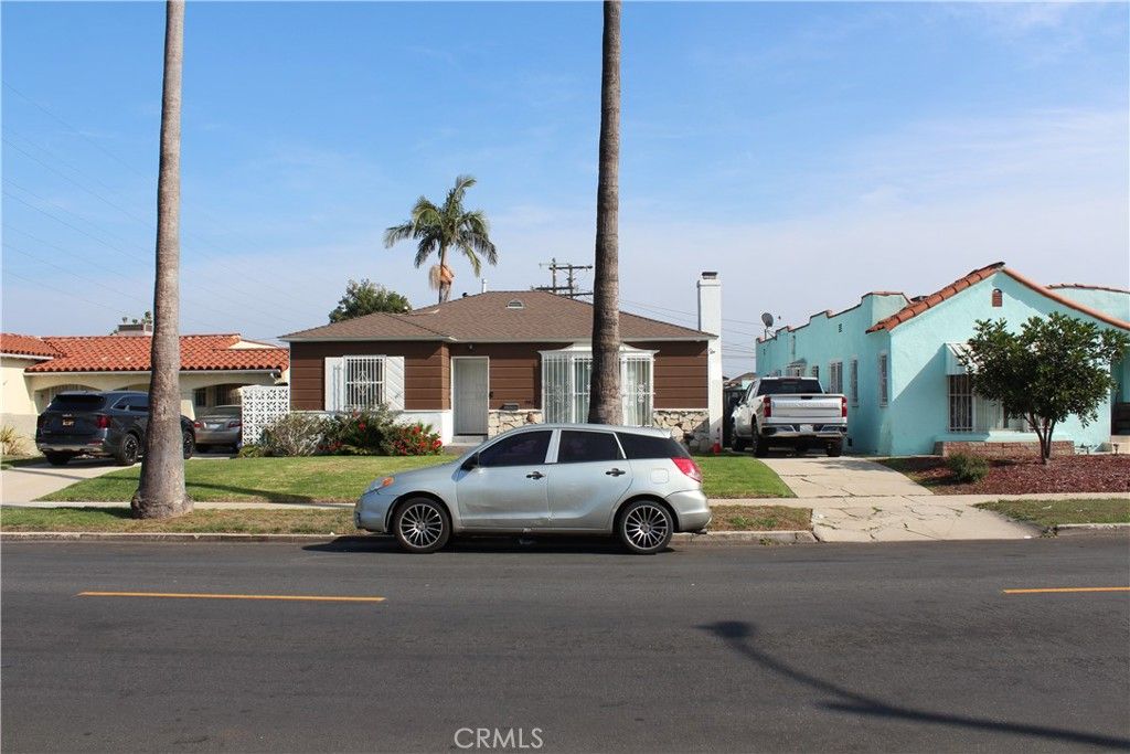 Photo of 9812 S Denker Ave, Los Angeles, CA 90047 (MLS # MB25252327)