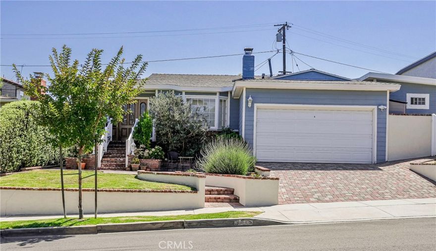 Welcome to this turn-key, single-story Victoria Knolls charmer, offering 3 bedrooms, Craftsman-inspired details, and a bright, open floor plan. A brick walkway leads through the beautifully landscaped front yard, complete with vegetable gardens and several fruit trees. Enter into a warm foyer and inviting living space with a large bay window, hardwood floors, brick fireplace, recessed lighting, and crown molding throughout. The upgraded kitchen with sleek contemporary details and breakfast bar, is conveniently adjacent to an oversized laundry room with generous storage. French doors open to your private backyard oasis and covered patio, perfect for entertaining or enjoying peaceful mornings. The primary suite boasts a remodeled bath with granite countertops. The home also features air conditioning for year-round comfort. Located in a highly rated school district and just a short stroll to Alta Loma Park, this home offers a wonderful blend of comfort, style, and convenience.