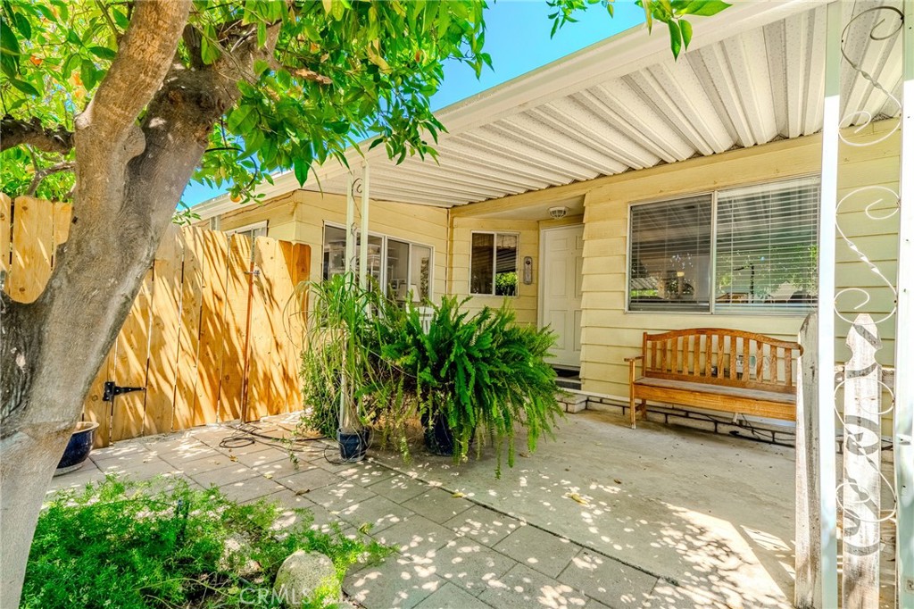 Charming 55+ Manufactured Home in Bautista Estates!
Discover comfortable living in this spacious 2-bedroom, 2-bath manufactured home on a permanent foundation, ideally situated in the desirable, sought-after Bautista Estates 55+ community in Hemet. Enjoy the updated kitchen with expansive gathering area for family and friends and a formal living room. An enclosed patio provides extra versatile space. This home boasts an inside laundry area with a custom build home office, large storage and carport. Your outdoor spaces have many varieties of mature fruit trees. Central AC and Heating and so much more. Low HOA fees and close to shopping/dining. Don't miss this opportunity! Schedule your showing today!
