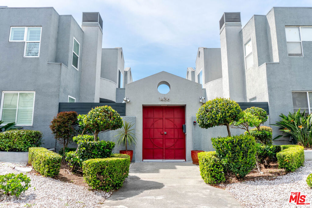 This fabulous townhouse is move-in ready! The fully renovated kitchen has granite countertops, custom cabinets, stainless-steel appliances and a marble backsplash. It connects to a flex space that can serve as a casual dining space, sitting room, office, or playroom. The adjacent powder room has also been remodeled.Down the hall, past the elegant staircase, sits a spacious great room combining the dining and living spaces with full wall sliding doors that allow and abundance of natural light inside. The elegant stacked-stone fireplace and view of the private, fenced-in yard (with private hot tub) are the outstanding focal points of the home. Upstairs, there are two oversized bedroom suites. The Guest Suite has upgraded closet systems and mirrored doors. The fully modernized bathroom has upgraded marble to the ceiling and features new vanity, and medicine cabinet. The Primary Suite has a large walk-in closet and spa-like bathroom, with an oversized shower featuring handheld, rain and standard shower heads. A floor to ceiling cabinet with electricity can neatly store linens, towels, toiletries, and more. In the hall is a laundry closet fitted for a full-size washer/dryer and upgraded tankless water system. Other features include understairs storage, two assigned, secure parking spaces, additional garage storage, upgraded three-zone A/C with app control, upgraded lighting fixtures, new toilets, and a secure courtyard to mingle with neighbors.