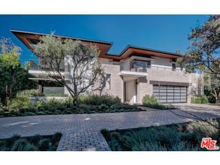 An achievement in design and architecture, this home is truly a cut above the rest. A recipient of a 2015 Beverly Hills Single Family Residential Design Award, this custom built home exudes a warmth rarely seen in Contemporary architecture. Located on one of the most desired streets in The Flats, the home overlooks Beverly Gardens Park and is only a short walk to the finest dining, shopping and entertainment in Beverly Hills. 5 years in the making, the home was constructed with a rich palette of the finest building materials and features unparalleled craftsmanship. The home features six bedrooms and eight bathrooms, an elevator, and home theater. Fully automated smart home technology controls the entire home. The backyard is an entertainer's dream with an outdoor kitchen, multiple conversation areas, pool, jetted spa, all surrounded by lush gardens and trees that provide extra privacy. Pre-qualified Buyers Only! Also, Available for Lease.