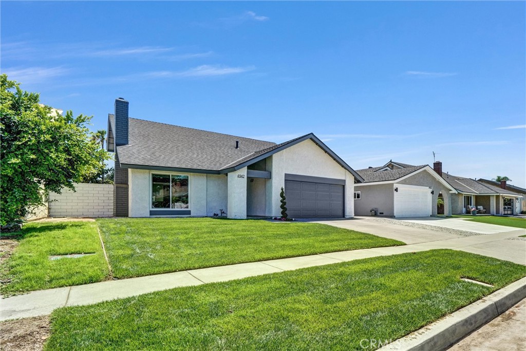 Completely Renovated 5-Bedroom Home with Main Floor Primary Suite. Step into this beautifully updated single-family home offering over 2,000 square feet of modern living space. Originally built in 1971, this residence has been thoughtfully redesigned from top to bottom and now lives like a brand-new home. With 5 bedrooms and 2.5 baths, including a sought-after main floor primary suite, there’s space for everyone. Inside, enjoy a light, bright, and airy feel enhanced by volume ceilings and abundant natural light. The stunning kitchen is a showstopper with quartz countertops, shaker-style cabinetry, designer open shelving, walk-in pantry and new stainless-steel appliances. A breakfast bar opens seamlessly to the spacious family room, perfect for entertaining. Upstairs, you’ll find four well-sized bedrooms and a beautifully remodeled full bath featuring dual sinks, a step-in tub/shower, and striking designer tilework. Additional highlights include mirrored wardrobe doors, recessed lighting throughout, new dual-pane windows, and new flooring throughout the entire home. Enjoy the outdoors in the large, private backyard—ideal for relaxing or weekend gatherings. This is a rare opportunity to lease a fully renovated home that combines the charm of an established neighborhood with the fresh appeal of modern upgrades.