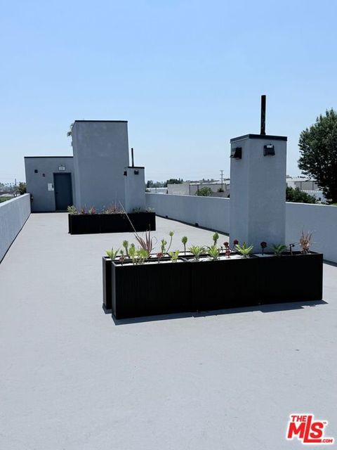 Photo of 1039 E 28th Street #306, Los Angeles, CA 90011 (MLS # 26657559)