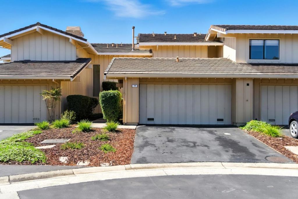 Welcome to 10 Azalea Ln in Crestview Estates, located on a quiet cul-de-sac in the scenic hills of San Carlos.This nicely updated 2-bedroom + den, 2.5-bath townhome located in the sought-after Crestview Estates community, is ideal for those seeking tranquility with easy access to urban amenities. Step inside to discover a spacious open living and dining area featuring vaulted ceilings, a cozy fireplace, and seamless access to a private west-facing patio perfect for entertaining or enjoying serene views of the surrounding open space. A versatile den/office overlooks the backyard, offering a quiet space for work or relaxation. The refreshed kitchen features new quartz countertops, a new electric range, and a new dishwasher. Upstairs, you'll find 2 ensuite bedrooms, each with ample closet space, hillside views, and natural light. Additional highlights include, attached two-car garage , access to community amenities: pool, spa, clubhouse, tennis courts, and playground, proximity to top-rated schools, downtown San Carlos for shopping and dining, and major commute routes (Hwy 280 & 92) , nearby parks, hiking/biking trails, and technology campuses . Whether you're enjoying the vibrant local dining scene or escaping into nature, this townhome offers the best of both worlds.