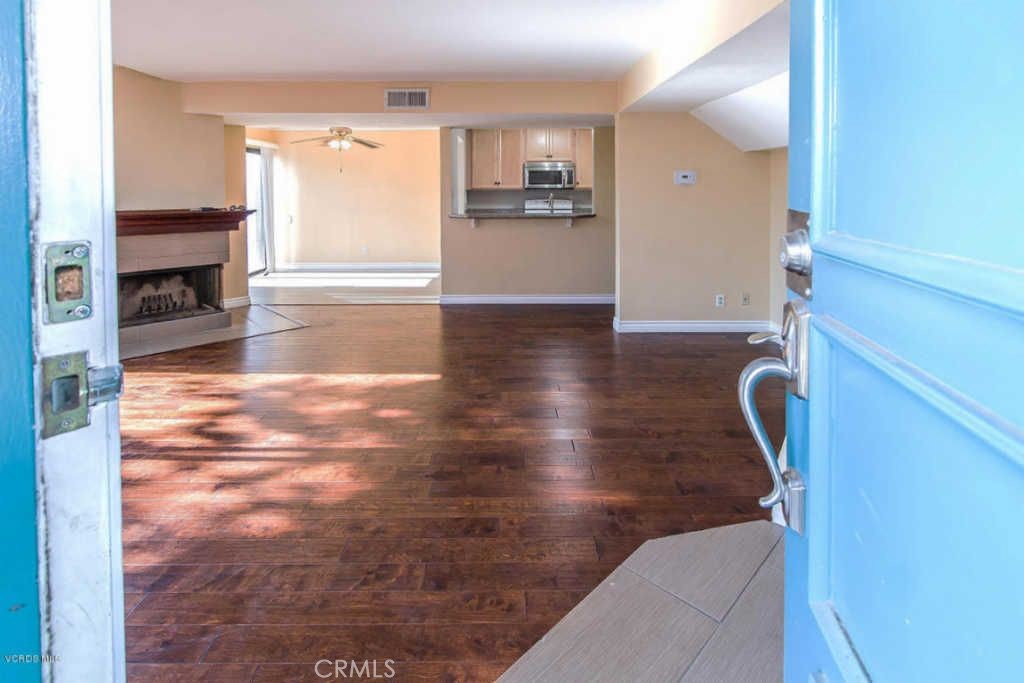 This townhouse-style unit features two bedrooms and two bathrooms, including a convenient guest bath on the main level. The first floor offers an open layout with a living room, dining area, and kitchen, along with in-unit laundry. A private patio provides a comfortable outdoor space for relaxing or entertaining. Upstairs includes two well-sized bedrooms and a full bathroom.
Located in a well-maintained complex with access to amenities such as tennis courts, swimming pools, and landscaped common areas.