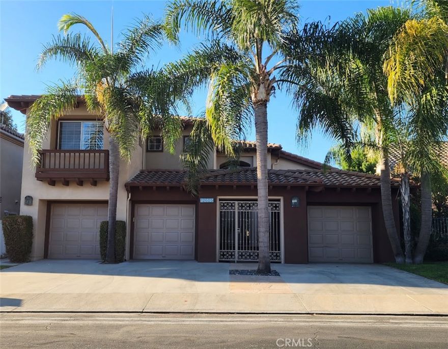 WONDERFUL FLOORPLAN LOCATED IN GATED COMMUNITY. BEDROOM AND 3/4 BATH DOWN (CURRENTLY USED AS AN OFFICE) WITH ADDITIONAL HALF BATH. FORMAL LIVING AND DINING AREAS, GOURMET KITCHEN WITH PLENTY OF CABINETS AND GRANITE COUNTERTOPS WITH CENTER ISLAND. THE KITCHEN OPENS TO A BREAKFAST NOOK WITH VIEW OF THE POOL. THE FAMILY ROOM FEATURES A FIREPLACE AND CUSTOM BUILT IN ENTERTAINMENT CENTER AND WET-BAR. BEAUTIFUL MARBLE FLOORS ADORN THE DOWNSTAIRS WITH NEUTRAL CARPET ACCENTS. UPSTAIRS OFFERS 3 BEDROOMS WITH A BONUS ROOM/BEDROOM AND A FULL BATHROOM WITH DUAL VANITY SINKS. THE MAIN BEDROOM IS HUGE AND FEATURES AN OVER-SIZED MAIN BATHROOM SUITE COMPLETE WITH DUAL SINK VANITY, SOAKING TUB, SHOWER STALL AND WALK IN CLOSET. THERE IS A 2-CAR ATTACHED GARAGE WITH EPOXY FLOORS. THERE IS AN ADDITIONAL DETACHED ONE CAR GARAGE WITH FRECH DOORS. (CAN BE USED AS OFFICE, STUDIO, PLAYROOM OR GYM) THE BACKYARD IS GREAT FOR ENTERTAINING AND BOAST A BEAUTIFUL POOL AND SPA. A CUSTOM BUILT-IN BBQ COMPLETES THE BACKYARD AMENTIES. GREAT LOCAL SHOPPING, AWARD WINNING SCHOOLS AND EASY ACCESS TO TRANSPORTATION MAKE THIS HOME HIGHLY DESIRABLE. NEW PAINT INSIDE AND OUT WITH A TERMITE CLEARANCE AND HAS A SECURITY SYSTEM ( YOU PAY TO CONNECT SERVICE)