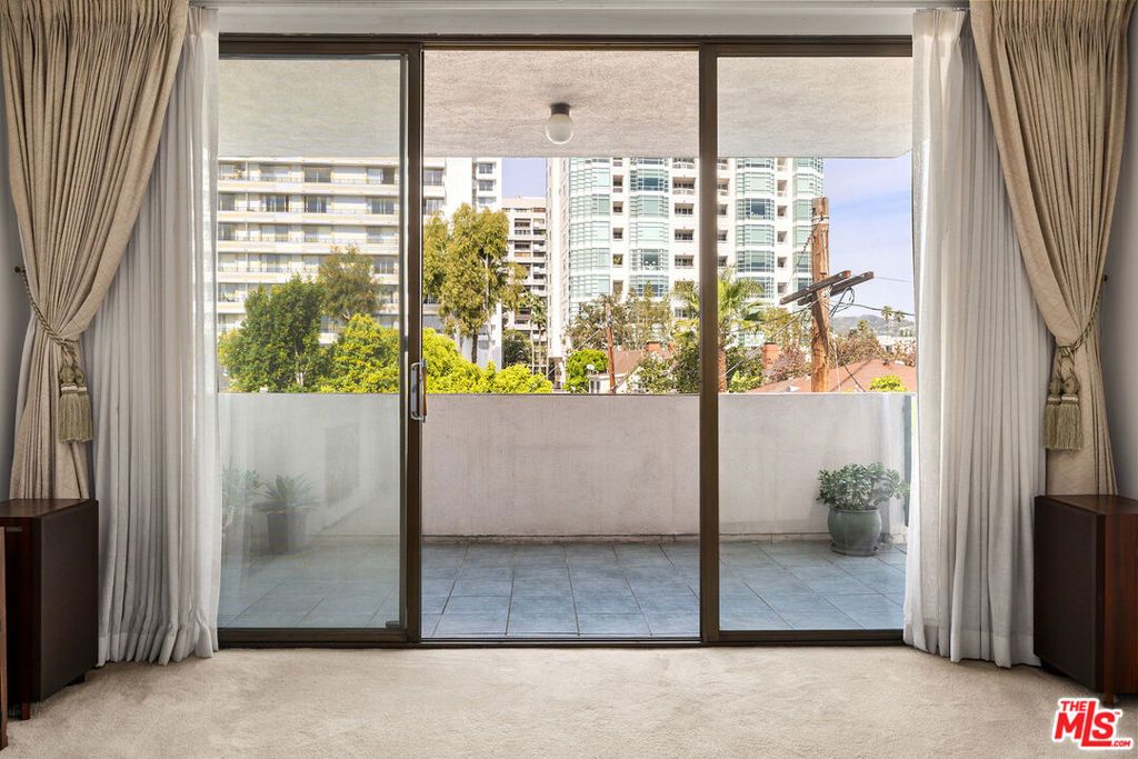 Photo of 1250 S Beverly Glen Boulevard #406, Los Angeles, CA 90024 (MLS # 26652991)