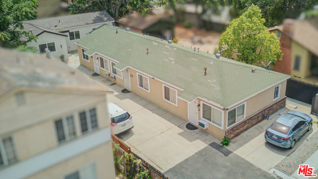 We are pleased to present a rare investment opportunity at 11334 Oxnard Street, a stabilized four-unit property in the heart of North Hollywood. The site includes three existing residential units, two 1 bedroom units and one 2 bedroom unit all occupied by reliable, long-term tenants, plus a newly constructed 2-bedroom, 1-bath ADU, completed in 2025. The ADU features approximately 740 square feet of high-end living space with modern finishes ideal for owner-users or additional rental income. Significant upgrades have been made to the entire property, including a new electrical panel serving all units and fully paid-off solar panels, reducing long-term operating costs. The property also includes six dedicated on-site parking spaces, providing an added convenience for tenants and increasing overall appeal in this competitive rental market. With a strong unit mix, updated infrastructure, and excellent in-place income, the asset is well positioned for stable cash flow and long-term value. The total building size is approximately 2,622 square feet, delivering an efficient footprint with desirable unit layouts. The property sits on a 7,043 SF lot, zoned RD2-1 with a Low Medium II Residential land use designation. Located within a Tier 1 Transit Oriented Communities (TOC) zone and a High Quality Transit Corridor, the site offers future development flexibility, including density bonuses and reduced parking requirements. Situated just off Tujunga Avenue and near major corridors like Lankershim and Laurel Canyon Boulevards, the property benefits from excellent walkability and proximity to studios, retail, restaurants, and Metro transit lines making this a highly desirable pocket for both residents and investors.