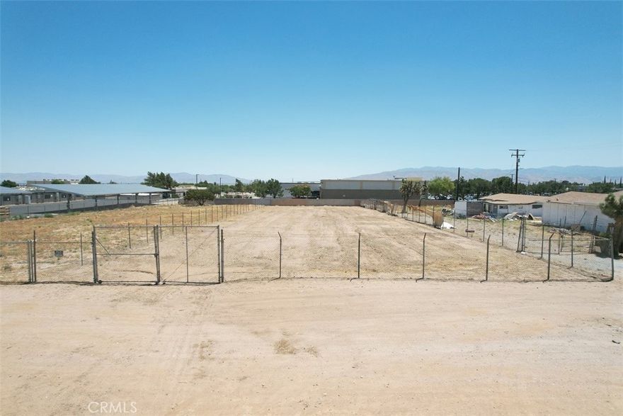Great location!!! ready to build your retail or office building, zoned Neighborhood Commercial,  Just off of Main St behind the Commercial Center by Main St and Maple Ave, completely fenced and level lot, water behind site, electricity on the street, sewer on Main Street and Desert Shadow Ln at corner with Tamarisk Ave. land location is behind of stater Bros Market. by Maple Ave and Main Ave and near of all mayor conveniences and the I -15 Fwy, don't miss this opportunity to own this well-located land, GOOGLE MAP CORDNATES ARE: 34.428278, -117.350444, BRING YOUR OFFER.