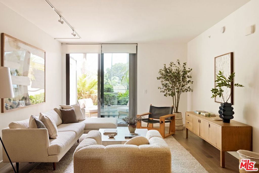 Why go on vacation when you can live in a resort-style residence every day? This spacious, west-facing condo, one block from the beach, is the largest one-bedroom floor plan in The Seychelle, a luxury full-service building in the heart of Santa Monica. Currently the lowest-priced unit available in The Seychelle, it perfectly combines contemporary design with everyday comfort. An open, light-filled layout features wide-plank wood floors, top-of-the-line cabinetry, and abundant storage. The sleek kitchen with stainless steel appliances and marble island flows seamlessly into the dining and living areas, leading out to a private patio perfect for relaxing or entertaining. The generous primary suite offers ample closet space, and the modern bath includes dual sinks with marble countertops and a glass-enclosed shower. Additional features include in-unit laundry, a guest powder room, and side-by-side gated parking. Residents at The Seychelle enjoy exceptional amenities: a rooftop saltwater pool with cabanas, hot tub, and lounge offering panoramic ocean views, outdoor BBQ's and dining areas, a fully equipped fitness center with a yoga/pilates studio, 24-hour concierge and doorman, conference room, and elegant courtyard. All of this, just minutes from the best dining and shopping Santa Monica and Venice have to offer and steps from the Pacific Ocean and Santa Monica Pier.
