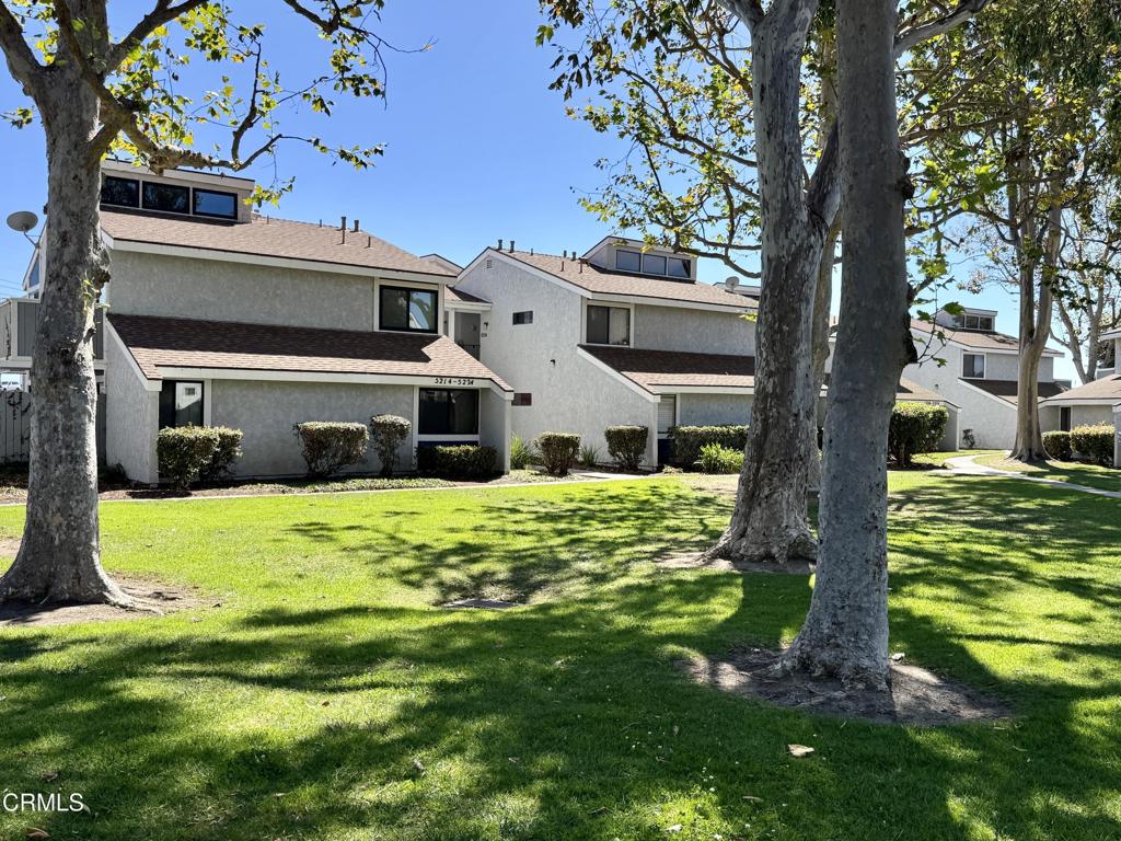Welcome to this freshly remodeled two-bedroom, one-bath property, offering a blend of comfort, style, convenience, and affordability. Nestled in a desirable community with low association dues, this upstairs corner unit features spacious living areas with high ceilings and abundant natural light. The home is highlighted by new wood-like flooring throughout. The remodeled kitchen boasts craftsman-style cabinetry and is equipped with stainless steel appliances and quartz countertops. The bathroom has also been remodeled with contemporary fixtures and finishes. Other conveniences include in-unit laundry hook-ups and a single-car garage. Future expenses will be minimal as this home has a new forced air heating unit. Don't wait! Schedule a visit today and spend the holidays in your new home!