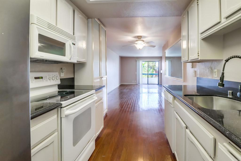 Rare Find in Golden Hill! This spacious 3-bed, 2-bath condo offers the best of downtown living with stunning south and west-facing city views, your front-row seat to the charm of the neighborhood! Soak in the cool breezes from the west and enjoy morning strolls to Balboa Park just a few blocks away. Surrounded by local cafes and eateries, this home puts you in the heart of a vibrant, walkable neighborhood. The open floor plan in the living room centers on a cozy gas fireplace. Featuring in-unit washer/dryer, designated two-car secure garage parking, a serene courtyard, and a welcoming community room. Opportunity awaits.