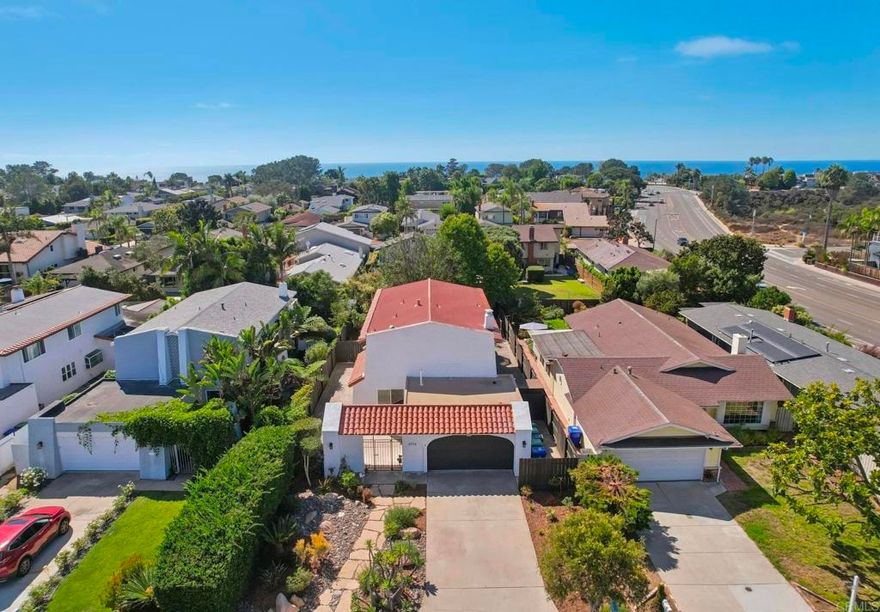 Situated west of the 5 in the coveted Del Mar Heights neighborhood, this stunning coastal residence offers an exceptional blend of style, comfort, and location. Inside, a spacious floorplan is anchored by a welcoming living room with fireplace, creating a warm space for everyday living and entertaining. The home’s remodeled kitchen and bathrooms showcase thoughtful upgrades with a modern, timeless appeal. Upstairs, the bedrooms open to an expansive private balcony, offering a retreat for lounging, dining, or simply enjoying the coastal breeze. Set on a generous lot, the property also features an oversized covered patio and upgraded garage with ample room to extend your lifestyle outdoors. Enjoy the best of Del Mar living just minutes from the Fairgrounds, racetrack, top schools, shopping/dining, the train station, and beautiful beaches—all while tucked away in a prime, sought-after location.