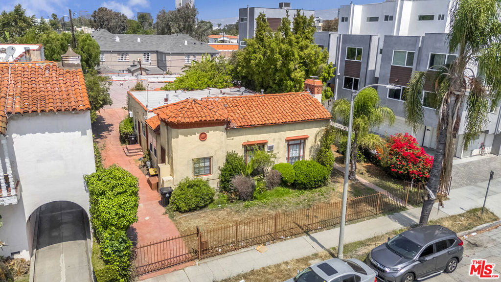 We are pleased to present a four (4) unit apartment building located at 1009 S Cochran Avenue in Los Angeles, California. The subject property is located in a prime Miracle Mile location, south of Wilshire Boulevard and west of La Brea Avenue. This is a rare opportunity to acquire a character-rich, Spanish-style fourplex in a prime Miracle Mile location, just minutes from Los Angeles' most vibrant commercial and cultural corridors. The property features an excellent unit mix two (2) one-bedroom units, one (1) two-bedroom unit, and one (1) three-bedroom unit, all of which will be delivered vacant, providing investors or owner-users the flexibility to renovate, reposition, or lease at market rates. The gated and secure property includes on-site parking and showcases classic Spanish architectural charm. Strategically situated with dominant access to Olympic Blvd, La Brea Ave, San Vicente Blvd, and Wilshire Blvd, the asset offers exceptional connectivity and walkability. Surrounded by new developments and high-end retail, the property is steps from The Grove and LACMA, and popular eateries like KazuNori and Met Her at a Bar making this a compelling investment in one of LA's most dynamic neighborhoods.