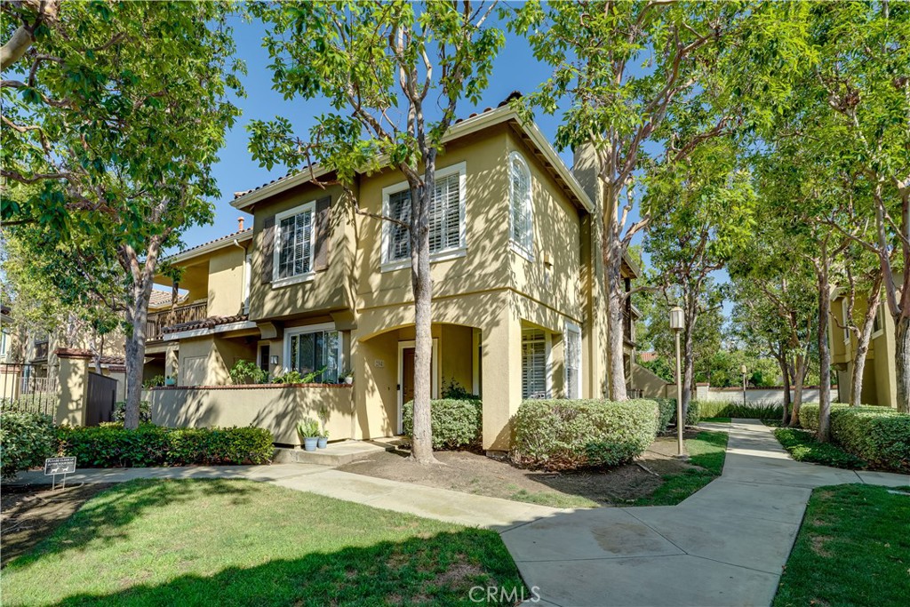 This 1,286 sqft corner-unit townhome is designed for both comfort and convenience. With 3 bedrooms and 2.5 bathrooms spread across two stories, it feels open and connected while still giving each space its own purpose. Large windows with custom shutters bring in plenty of light, and the open main level flows easily from the kitchen to the dining and living areas. Outside is your private patio for a morning coffee or evening unwind.
Upstairs, the primary bedroom has its own bathroom and walk-in closet, while two additional bedrooms share a full bath. There’s also a guest bathroom downstairs and a dedicated laundry room to keep chores out of sight. A newer AC unit keeps the home comfortable year-round and the property has been re-piped.
The community has plenty to enjoy, multiple pools, relaxing spas, a fully equipped gym, and beautifully kept grounds perfect for relaxing. You’re in a top-rated school district and just minutes from Tustin Ranch Golf Course, parks, shopping, and dining.
This is a place where you can enjoy the best of both home comfort and community living.