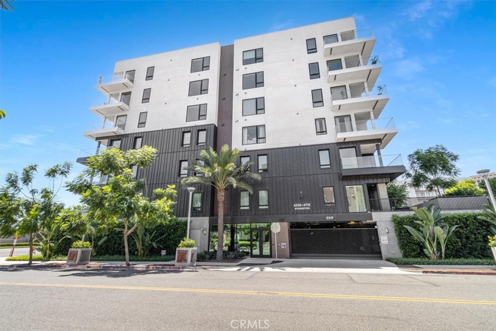 Welcome to 4209 Rivington at Lexington in Central Park West, where modern luxury and convenience meet in one of Irvine’s most desirable communities. This nearly 2,000 sq. ft. corner residence stands apart with its generous scale, rare construction features, and access to resort-style amenities. SPACIOUS & INVITING: Oversized rooms create comfort and flexibility. The primary suite is a true retreat with space for a sitting area, while the open-concept living, dining, and kitchen spans a dramatic footprint that’s perfect for entertaining. At the center of it all, a striking 14-foot kitchen island anchors the chef’s kitchen, offering abundant workspace and an inviting hub for gatherings. This floorplan also includes an extra closet for added storage. PRIVATE & PEACEFUL: Enjoy rare privacy with no homes looking in and only one common wall. Reinforced 12-inch concrete slabs—a premium feature found in only a handful of Lexington residences—ensure quiet living, while metal stud construction and double-paned windows add durability and sound resistance. LIGHT-FILLED CORNER UNIT: South-facing exposure fills the home with natural light all day. Smart-home features such as a Ring alarm, WiFi-enabled appliances, remote-access community doors, and a smart thermostat bring ease and security. Additional highlights include dual entry, a private patio for morning coffee or evening gatherings, and two side-by-side parking spaces conveniently located next to the exit stairwell. This chic Lexington residence also includes quartz countertops, GE Monogram appliances, designer cabinetry, and commercial-grade WiFi. Residents also enjoy access to an 8,000 sq. ft. clubhouse and recreation center, junior Olympic saltwater pool, three outdoor Jacuzzis, a cutting-edge fitness center, and outdoor half basketball and Pickleball courts. Exclusive Lexington offerings include a gated dog park, cabanas, BBQ grills, fireplaces, flat-screen TVs, foosball and ping pong tables, outdoor workspaces, EV charging stations, and direct access to the future Jamboree pedestrian bridge slated for completion in 2027. Perfectly situated at Michelson Drive and Jamboree Road, Lexington offers access to South Coast Plaza, Fashion Island, Irvine Spectrum, UCI, John Wayne Airport, and major freeways. With its spacious interiors, unique concrete slab construction, premium amenities, and unbeatable location, this Rivington residence is truly a gem within one of Irvine’s premier communities.