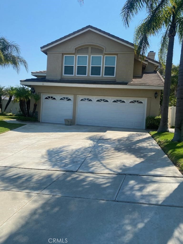 Lovely two story 4 bedroom 2.5 bath home, in the Hills of the prestigious Sierra Del Oro community in West Corona, minutes from Orange County, great floor plan, impressive entry to an open living and dining room filled with natural light and soaring ceilings, spacious kitchen with granite countertops, plenty of cabinets and built-in appliances, open to a cozy family room with a gas fireplace, indoor laundry room, 3 car garage with automatic opener and direct access to interior, big backyard beautifully landscaped, solar panels to save energy cost, wonderful neighborhood close to everything!! HOA and gardener included in the price!!!