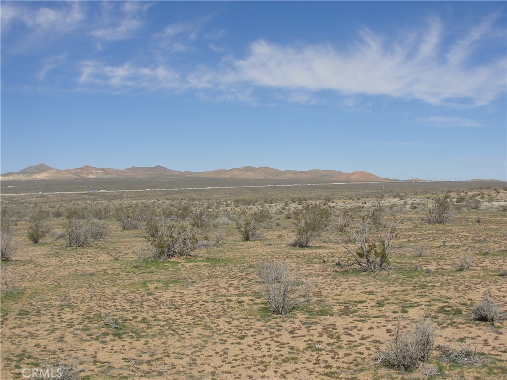 OPPORTUNITY KNOCKS!!! NOW IT THE TIME TO INVEST IN A 9.47 ACRE PARCEL SITUATED NEAR THE 15 FWY IN APPLE VALLEY WITH UP COMING DEVELOPEMENTS , NEAR THE WALMART DISTRIBUTION CENTER AND THE FUTURE HIGH SPEED RAIL TRAIN TO LAS VEGAS!!THE DESERT LANDSCAPE PROVIDES A BLANK CANVAS THE ONLY LIMITATIONS ARE YOUR OWN IMAGINATION.