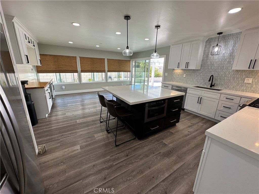 Photo of 936 Jasmine Cir, Costa Mesa, CA 92626 (MLS # NP26072063)