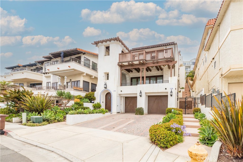 Welcome to your dream coastal escape at 119 Boca de la Playa—Furnished or Unfurnished luxury condo just steps from the sand, directly across from the Ole Hanson Beach Club. Enjoy panoramic ocean views from Dana Point to Catalina Island, with whitewater crashing right below your balcony. This 3 bed, 3.5 bath Spanish-style home features two spacious oceanview decks, collapsible glass doors for seamless indoor-outdoor living, a chef’s kitchen with Wolf range, hardwood floors, custom tile, and designer details throughout. The open-concept layout is ideal for entertaining or simply soaking in the coastal breeze. Walkable to the beach trail, shops, restaurants, outlets, train station, and trolley stops—this is the ultimate SoCal lifestyle. Live the vacation lifestyle—every day.