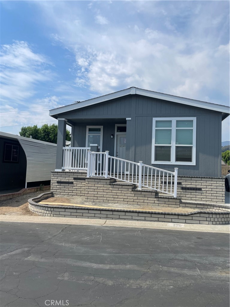 Brand New 2024 Manufactured Home in a Five Star Senior Community. Open Kitchen with a large centered Island featuring quartz countertops. Includes a Dining room and large Living room. French doors lead to an optional Den or Office. Flooring includes both carpet and vinyl wood panel style.
New appliances include Stainless Steel Refrigerator, Stove/Oven and Microwave. Dishwasher, and Large stainless steel Farm Style sink. White Cabinetry, Dual pane windows offer plenty of natural lighting. Extra large walk in closet in the Master Bedroom. Master Bathroom has lighted dual vanity mirrors and dual sinks with a walk in shower.