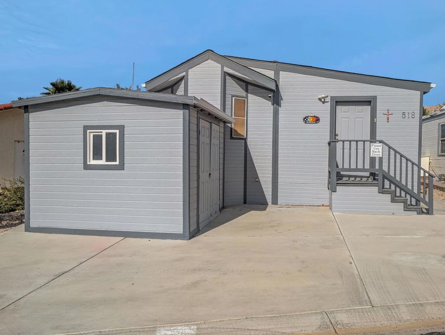 Caliente Springs Resort is an exclusive, gated community for ages 55 and up. This spotless 2004 Cavco Park Model offers around 550 sq. ft. of living space with one bedroom and one bathroom. It sits on the lush 8th hole of the golf course, surrounded by beautiful local scenery, mountains, and ponds--all of which you can enjoy from your fully covered deck, perfect for relaxing in peace. Updates include new flooring, a new deck, an upgraded bathroom with a tiled walk-in shower and an energy-efficient toilet, a walk-in closet, paved parking, landscape irrigation, and more. A golf cart is also included for convenient travel around the park. Community amenities feature 8 pickleball courts, tennis courts, laundry facilities, a library, fitness center, a 9-hole golf course, and mineral-fed hot springs pool and spas. In addition to the impressive features of the home and resort, residents enjoy an active social calendar with group activities, classes, and gatherings that foster a warm sense of community. The resort's gated security offers peace of mind, while its prime location provides convenient access to shopping, dining, and local attractions, making everyday living both comfortable and enjoyable. Whether you're seeking a tranquil retreat or an engaging lifestyle, Caliente Springs Resort combines the best of both worlds for those looking to embrace the next chapter in a vibrant 55+ setting. Lot is not owned; space rent is $950 per month.