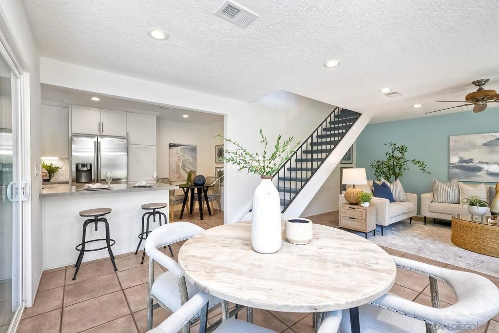 Bright, stylish, and full of charm—this upgraded 3-bedroom, 2.5-bath end-unit townhome in Encinitas' sought-after Village Park neighborhood is the one you've been waiting for. Thoughtfully updated and flooded with natural light, this home offers an ideal layout with all bedrooms upstairs and open-concept living below. The kitchen features quartz countertops, stainless steel appliances, and a spacious walk-in pantry—perfect for those who love to cook or entertain. Triple-pane white vinyl windows bring in sunshine while keeping things energy efficient, and owned solar (fully paid off) adds even more value and long-term savings. The updated bathrooms showcase clean and timeless finishes, and the wide-plank flooring adds warmth throughout. Step outside to your own private garden patio, a peaceful retreat that connects seamlessly to the beautifully maintained HOA greenbelts and walking paths. Residents also enjoy access to a community pool, spa, tennis and pickleball courts, and playground—a true neighborhood oasis. Set in a prime location just minutes to beaches, top-rated schools, shopping, and dining, this home blends comfort, convenience, and community. Don’t miss your chance to fall in love—schedule your showing today!
