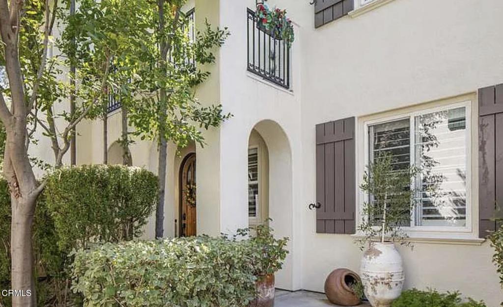 Step into this beautifully upgraded 4-bedroom, 3-bathroom residence offers the perfect blend of luxury, comfort, and location. Tucked behind the gates of one of Valencia's most sought-after communities, this home features a flexible floor plan ideal for both everyday living and entertaining.Downstairs, you'll find a private in-law suite with its own full bathroom--perfect for extended family, guests, or a quiet home office. Upstairs, the spacious primary suite offers a peaceful retreat.High ceilings, designer finishes, and natural light fill every corner, creating a warm, inviting atmosphere. Step outside to a beautifully landscaped yard ready for weekend BBQs or cozy evenings under the stars.Located just minutes from award-winning schools, shopping, dining, and paseos, this home checks every box--and then some.