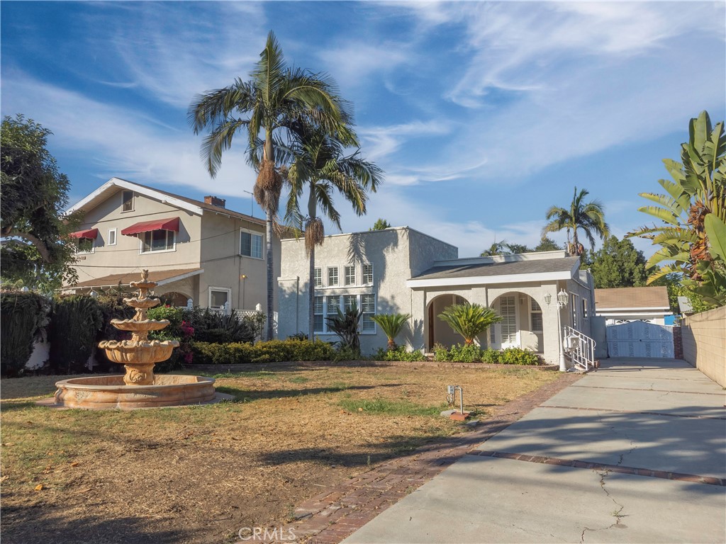 Location, Location ... Welcome to 326 S. Granada Ave, a stunning 1923 Spanish - style home nestled on a quiet, tree- lined street one of Alhambra' s most desirable neighborhoods. This elegant single-family residence offers 4 bedrooms and 2 bathrooms with 2115 sq ft living space. Inside you will a find a spacious formal living room with cozy fireplace, a dedicated dinning, and beautiful original hardwood floors that bring warmth and timeless character to the common areas. The home has been thoughtfully updated, including a renovated kitchen, flooring, modern bathrooms, upgraded plumbing, and a newer roof -- all completed just two years ago. Additional improvements include fresh interior and exterior paint, all - new lighting throughout, and a convenient indoor laundry room. Set on a generous 9283 Square foot lot, the property offers a detached two car garage, a long driveway, and a large backyard that's perfect for entertaining family and friends. An Ideally near school, parks and shopping.