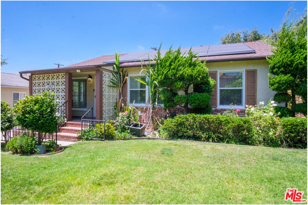 Nestled in the picturesque, tree-lined Culver Crest neighborhood of Culver City, this beautifully remodeled three-bedroom, two-bath traditional home seamlessly blends timeless charm with modern updates. Located within Culver City's award-winning school district, this home has been thoughtfully upgraded. The residence features rich wood paneling, rock fireplace, custom built-in bookshelves, hardwood floors, and classic plantation shutters. Includes Tesla Solar and battery system . Perfectly situated just minutes from Playa Vista's booming tech hub, LAX, and only five miles from the beach. Commuters will love the easy access to the Expo Line which connects Downtown LA to Santa Monica. With its unbeatable location, updated amenities, and access to Culver City's award-winning schools, this is truly the perfect place to call home. Easy to show.