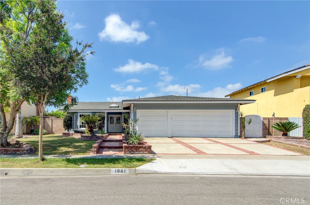 Welcome to this charming single-level home offering four bedrooms, two and a half bathrooms, and a spacious lot in a sought-after Mesa Woods neighborhood. From the moment you arrive, you'll appreciate the inviting curb appeal, highlighted by mature landscaping, classic brickwork, and a three-car garage with ample parking and storage.
Inside, the home features an open and airy layout filled with natural light—perfect for both everyday living and entertaining. A spacious living room with a cozy fireplace flows seamlessly into the dining area and kitchen, creating a warm and inviting atmosphere. The kitchen includes a large center island with a generous breakfast bar, stainless steel appliances, and ample cabinet space—ready for your personal touches or future updates. Just off the kitchen, the family room offers another comfortable gathering space with direct access to the backyard and a smooth indoor-outdoor connection.
The thoughtful floor plan includes four well-sized bedrooms, including a private primary suite with its own bathroom, along with two additional baths to accommodate guests and family. With beautiful flooring throughout, soft neutral tones, and an abundance of windows, the home feels both bright and welcoming.
Located just a few blocks from two lovely neighborhood parks, this home also offers easy access to South Coast Plaza, world-class dining, and shopping. With the 405 freeway nearby, you’ll enjoy both convenience and community in one of Orange County’s most desirable locations.