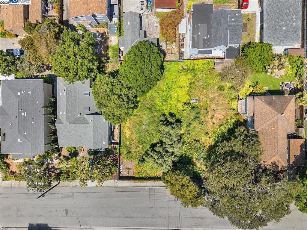 Design-Ready Lot in Alameda’s West End. Welcome to 309 Spruce Street, an approximately 5,000 square foot parcell, tucked away on a cul-de-sac just accessing Woodstock Park. R-4 Zoning offers flexibility for development. Preliminary Plans by Baran Studio Architecture envision a two-story single-family home plus a detached ADU—bringing modern design to a beloved neighborhood (buyers to confirm feasibility with the City of Alameda). Opportunities like this in Alameda’s West End don’t come around often. Whether you’re a builder, architect, or future homeowner, this is a canvas ready for your next chapter. Buyers to verify zoning, development potential, and utility access with the City of Alameda