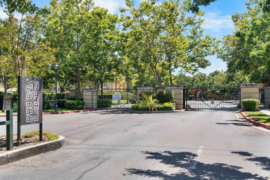 Move in ready 2-bedroom, 2.5-bath corner townhome offers 1,174 sq. ft. of modern comfort and style, nestled within the sought-after, gated Liberty Commons Community. Home is filled with abundant natural light, creating a bright and airy ambiance throughout the home. enhanced by its northeast-facing orientation. Inside, you'll find gleaming hardwood floors throughout and modern design touches in every corner. The updated kitchen is thoughtfully appointed with quality finishes perfect for both everyday living and entertaining. Additional upgrades include a newer HVAC system and newer in-unit washer, dryer and refrigerator making this home functional & beautiful. 2 car oversized attached garage.