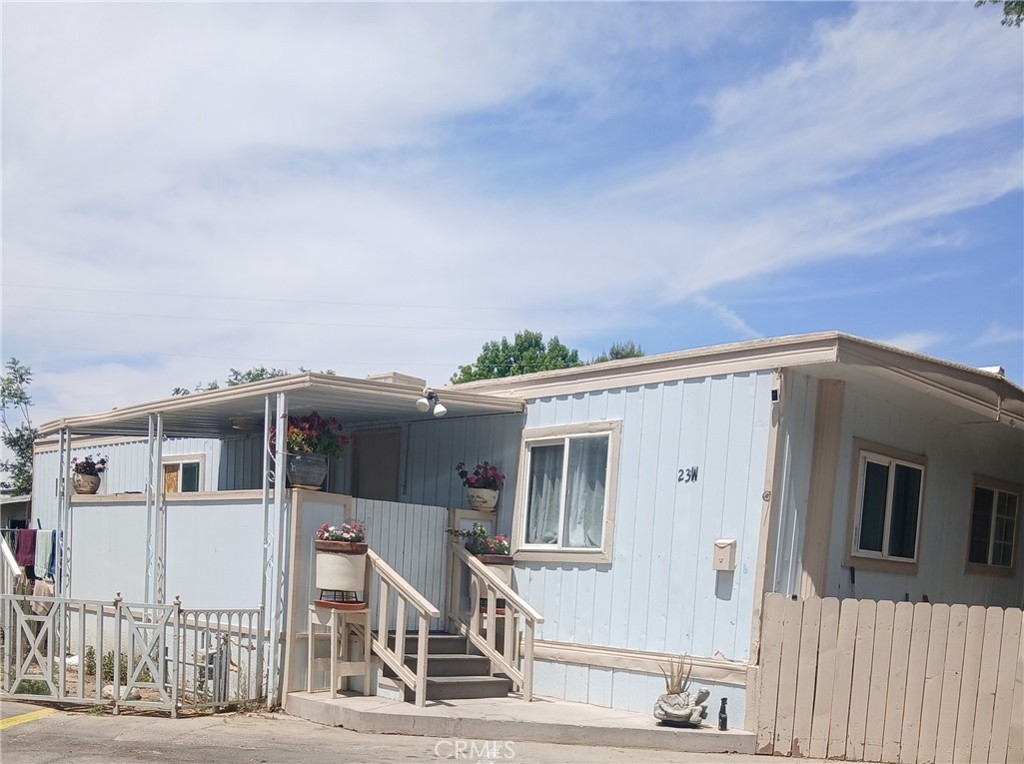 Welcome to Desert Palms in Lancaster Ca! This Golden West Mobile Home offers 4 bed 1 bath and has plumbing hook ups to add another bathroom in one of the bedrooms rooms. The kitchen has been updated and expanded to have an open floor plan. Dining and Living room with adequate space. The mobile home offers a front yard, and two side yards. Also assigned parking spaces in front of the home that can fit large vehicles. Low space rent and must be approved by the mobile home park upon purchase.