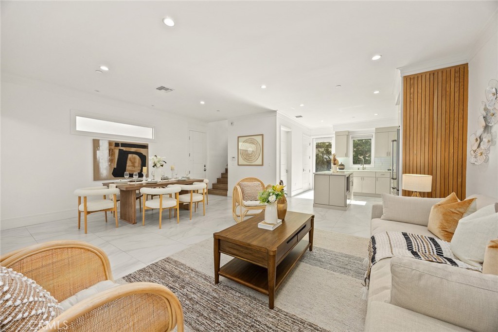 LOCATION, LOCATION, LOCATION! This architecturally designed townhouse is perfectly situated in the heart of Arcadia, offering the ideal blend of luxury, comfort, and convenience. Boasting 4 spacious bedrooms and 5 well-appointed bathrooms, this stunning residence welcomes you with soaring ceilings and exceptional craftsmanship from the moment you enter.Thoughtfully designed with eco-conscious living in mind, the home showcases a bright and airy open floor plan, enhanced by large double-glazed windows that fill the space with abundant natural light. The custom chef’s kitchen is a culinary dream, complete with handcrafted cabinetry, quartz countertops, and a central island—perfect for meal preparation and gathering with family and friends.The open-concept living and dining areas are enhanced by modern LED lighting, creating a warm, inviting ambiance ideal for entertaining or everyday living. Retreat to the elegant master suite, complete with a spacious walk-in closet and a spa-inspired bathroom featuring a beautifully designed vanity and premium finishes.Throughout the home, durable vinyl flooring and multiple sliding glass doors provide seamless indoor-outdoor connectivity, ideal for enjoying Southern California’s year-round sunshine.Located just minutes from top-rated Arcadia schools, beautiful parks, premier shopping and dining, and the 210 and 10 freeways, this move-in-ready home is a rare opportunity offering both versatility and convenience.
Truly a gem in the vibrant Arcadia community—don’t miss it!