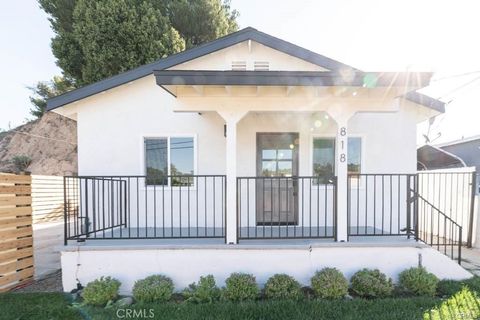 Photo of 818 N Avenue 51 Ave, Los Angeles, CA 90042 (MLS # DW26088840)