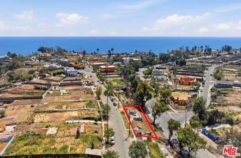 Photo of 545 N Las Casas Avenue, Los Angeles, CA 90272 (MLS # 26873757)