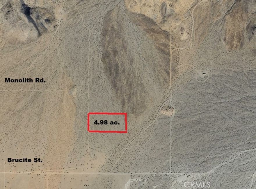 4.98 acres of serene surroundings.  This parcel lends itself as a great recreational property, bring your toys and enjoy, or investment possibility. (Latitude 34.580515 Longitude -116.933329)  (The address on this listing is not a county assigned address and is being used solely for the purpose of identification of this listing on the MLS and media.)