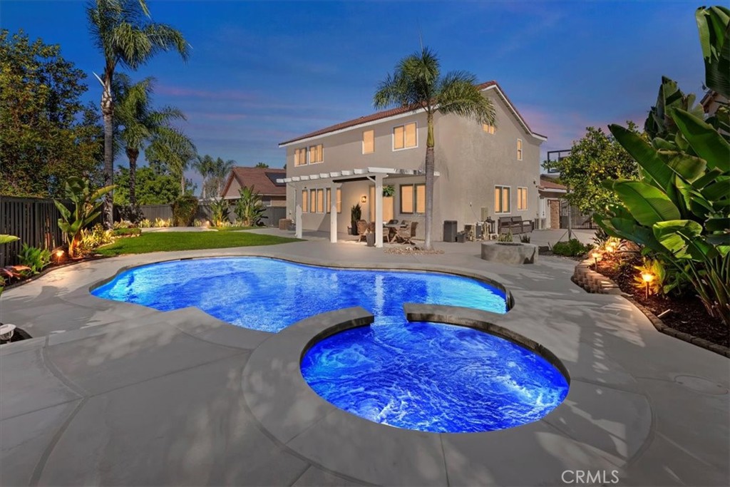 Fantastic Pool Home Opportunity!
This beautifully maintained home features fresh exterior paint, drought-resistant front yard landscaping, and RV parking with double gates. Inside, you’ll find dual pane windows with shutters throughout and a great floor plan that blends comfort and style.
The upgraded kitchen offers quartz countertops, modern cabinets, and an island that opens to the family room with a cozy fireplace. There’s a convenient bedroom and full bathroom on the first floor. Upstairs, the primary suite includes a walk-in closet, and the guest bathroom has been updated with new cabinets, countertops, and a walk-in tile shower. You’ll also find a loft/office area and a convenient upstairs laundry room.
The garage is fully finished with drywall, built-in cabinets, epoxy flooring, and its own A/C system—perfect for a workshop, gym, or hobby space.
Enjoy entertaining in the backyard with an Alumawood patio cover, a recently resurfaced pool and spa, and a relaxing fire pit area. Even all the pool equipment has been replaced!
Located in a great community close to shopping, restaurants, and more—this home has it all!