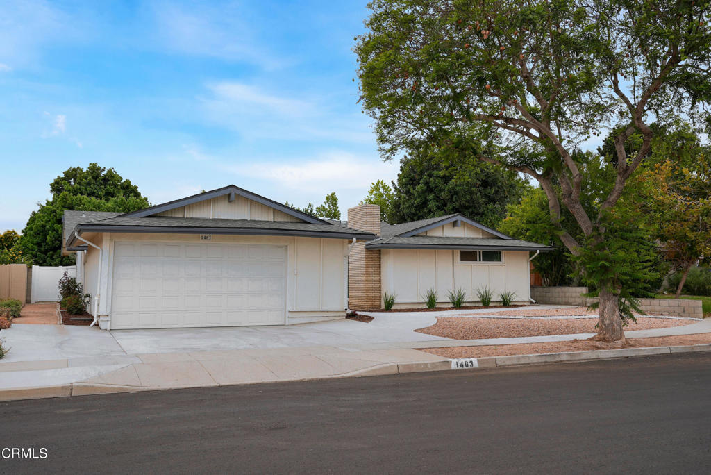 Welcome to 1463 Mandalay Court--nestled on a quiet cul-de-sac in one of Ventura County's most desirable communities. This spacious 3-bedroom, 3-bath home offers a flexible layout on a large lot, with room to live, work, and entertain.Step inside to freshly painted interiors, brand new laminate flooring throughout, and abundant natural light through out and newer windows. The kitchen is equipped with breakfast counter, dine in space, stainless steel appliances, granite countertops, and ample cabinet space. Large living room and dining room are ready to host friends and family or for quiet evenings in. The original garage was converted to living space within a few years of the home being built in 1961 and this BONUS living space is updated with new floors and paint with two separate entrance points and its own bathroom now stands ready to be your junior ADU-- host guests, in-laws, or become rentable space. The current garage is oversized garage with extra height and offers boat parking or easy storage of tall vehicles and offers workshop space and epoxy flooring. The yard is a blank slate, ready to transform into your garden oasis under Camarillo's sunny skies and coastal breezes. Enjoy peace and privacy while being minutes from schools, parks, local dining, shopping, and easy freeway access for a smooth commute. Living in Camarillo means enjoying a warm community feel, nearby beaches, and vibrant farmers' markets, all while benefiting from a mild coastal climate year-round.Don't miss the opportunity to make this your home and enjoy the best of Camarillo living!