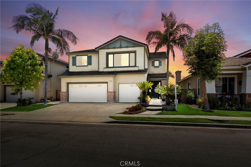 THIS HOME IS A MUST SEE! Beautiful home located in the highly sought-after neighborhood in Olinda Ranch! This home features a bright and open floorplan with 5 bedrooms, 3 bathrooms PLUS A BONUS ROOM. Upon entering, you are greeted by the living room which has plenty of natural lighting and is adjacent to the formal dining room. The beautiful kitchen includes beautiful cabinets, kitchen island with counter seating, gas cooktop, breakfast nook and overlooking the family room which makes it great for entertaining. The spacious family room features a cozy fireplace, media nook and windows for natural lighting. The main floor also features a DOWNSTAIRS BEDROOM with walk-in closet, full sized bathroom and laundry room down the hall. The upstairs showcases a spacious Primary Suite that includes a spacious bedroom with retreat area, large balcony WITH DISNEYLAND FIREWORKS & CITYLIGHTS VIEW. The primary bathroom features a double sink vanity, soaking tub, glass enclosed shower and large walk-in closet. Down the hall are the secondary bedrooms, beautiful full bath, tech center and LARGE Bonus Room. The Private backyard is beautifully designed with concrete patio area, mature landscaping and scenic views. Additional features of the home include 3 car garage, NEW Carpet, and new appliances. Located in the Award-Winning Brea Olinda Unified School District and located close to restaurants, entertainment, Brea Mall, and Downtown Brea. Come view this beautiful house and make it yours today!